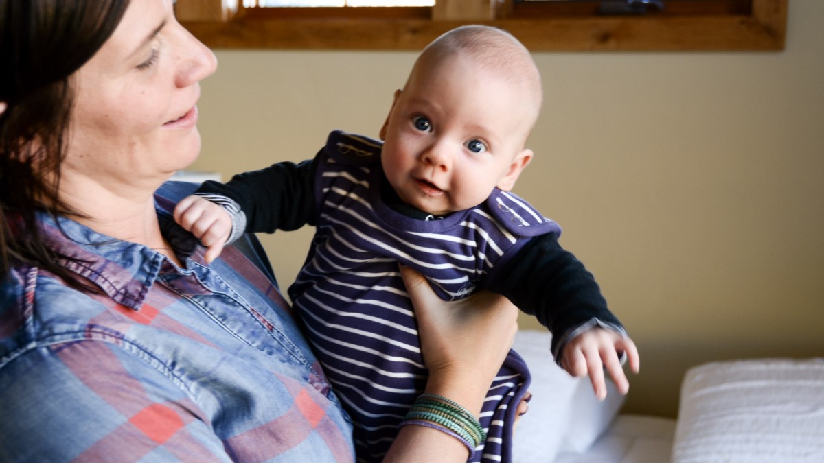 Best Baby Swaddle Review (Our 2 1/2mo tester was comfy and cozy in the Woolino sleep sack.)